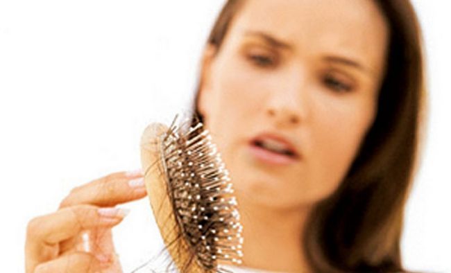 Photographie - Les médicaments sur ordonnance peuvent causer la perte de cheveux